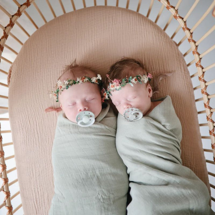 Mini Muslin Crib Sheet by Mushie at $23.99! Shop now at Nestled by Snuggle Bugz for Nursery & Décor.
