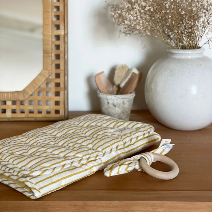 On the Go Portable Changing Pad by Pehr Designs at $57.99! Shop now at Nestled by Snuggle Bugz for Nursery & Décor.