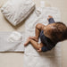 On the Go Portable Changing Pad by Pehr Designs at $57.99! Shop now at Nestled by Snuggle Bugz for Nursery & Décor.