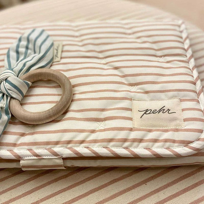 On the Go Portable Changing Pad by Pehr Designs at $57.99! Shop now at Nestled by Snuggle Bugz for Nursery & Décor.