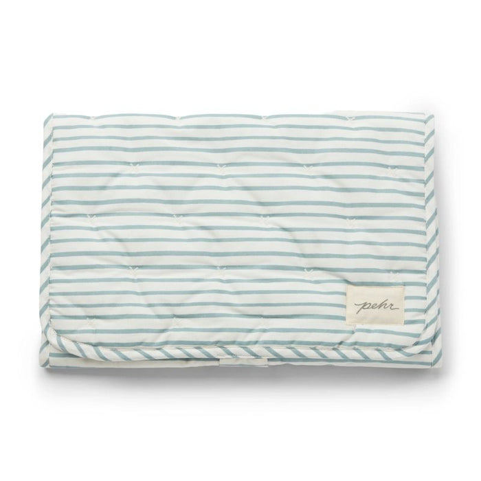On the Go Portable Changing Pad by Pehr Designs at $57.99! Shop now at Nestled by Snuggle Bugz for Nursery & Décor.