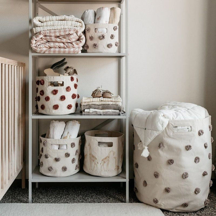 Pom Pom Hamper by Pehr Designs at $97.99! Shop now at Nestled by Snuggle Bugz for Nursery & Décor.