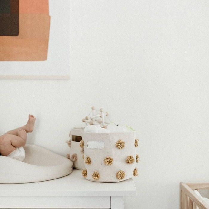 Pom Pom Basket - Mini by Pehr Designs at $29.99! Shop now at Nestled by Snuggle Bugz for Nursery & Décor.