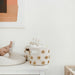 Pom Pom Basket - Mini by Pehr Designs at $29.99! Shop now at Nestled by Snuggle Bugz for Nursery & Décor.