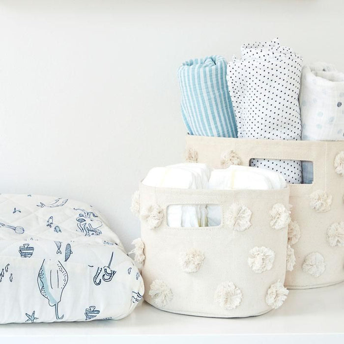 Pom Pom Basket - Mini by Pehr Designs at $29.99! Shop now at Nestled by Snuggle Bugz for Nursery & Décor.