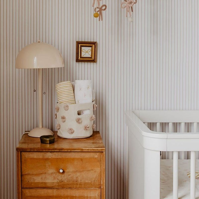 Pom Pom Basket - Mini by Pehr Designs at $29.99! Shop now at Nestled by Snuggle Bugz for Nursery & Décor.