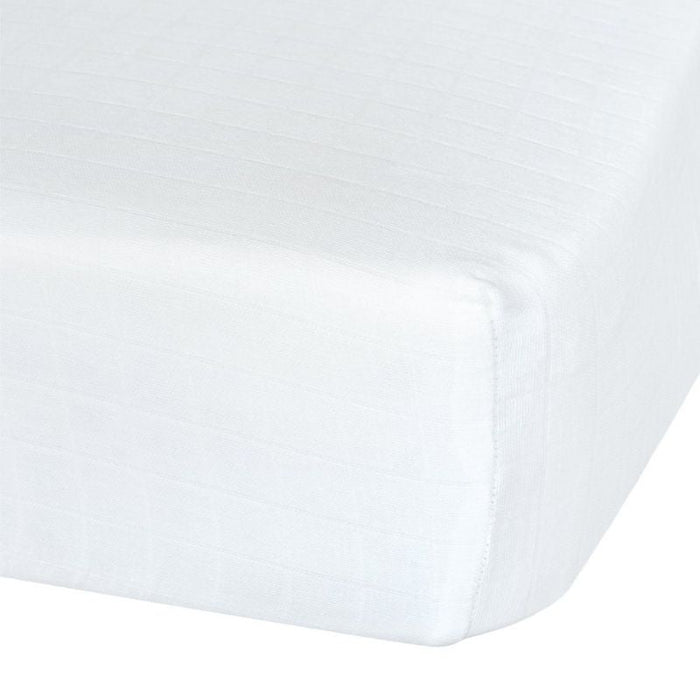 Cotton Muslin Fitted Sheet by Perlimpinpin at $31.99! Shop now at Nestled by Snuggle Bugz for Nursery & Décor.