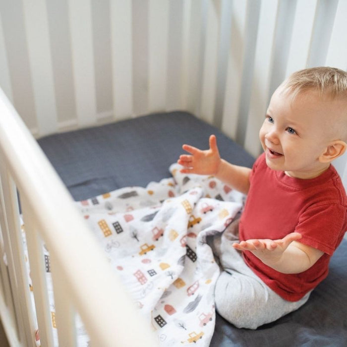 Organic Muslin Swaddle by Perlimpinpin at $10.39! Shop now at Nestled by Snuggle Bugz for Nursery & Decor.
