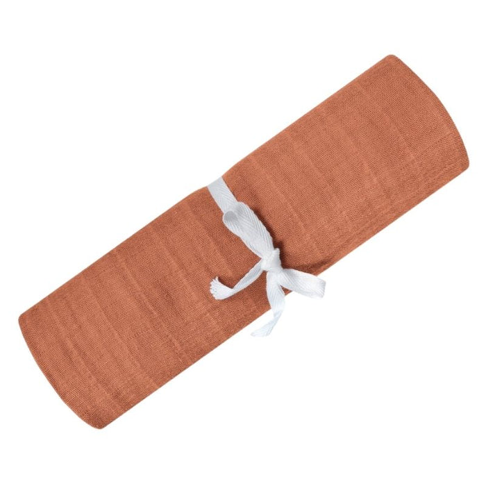 Organic Muslin Swaddle by Perlimpinpin at $10.39! Shop now at Nestled by Snuggle Bugz for Nursery & Decor.