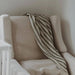 Sailor Muslin Baby Blanket by Pokoloko at $39.99! Shop now at Nestled by Snuggle Bugz for Nursery & Décor.