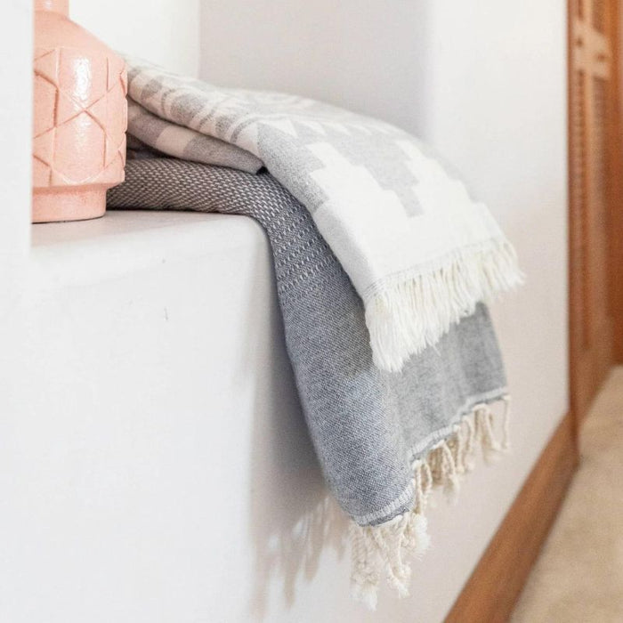 Staple Lambswool Throw by Pokoloko at $144.99! Shop now at Nestled by Snuggle Bugz for Nursery & Décor.