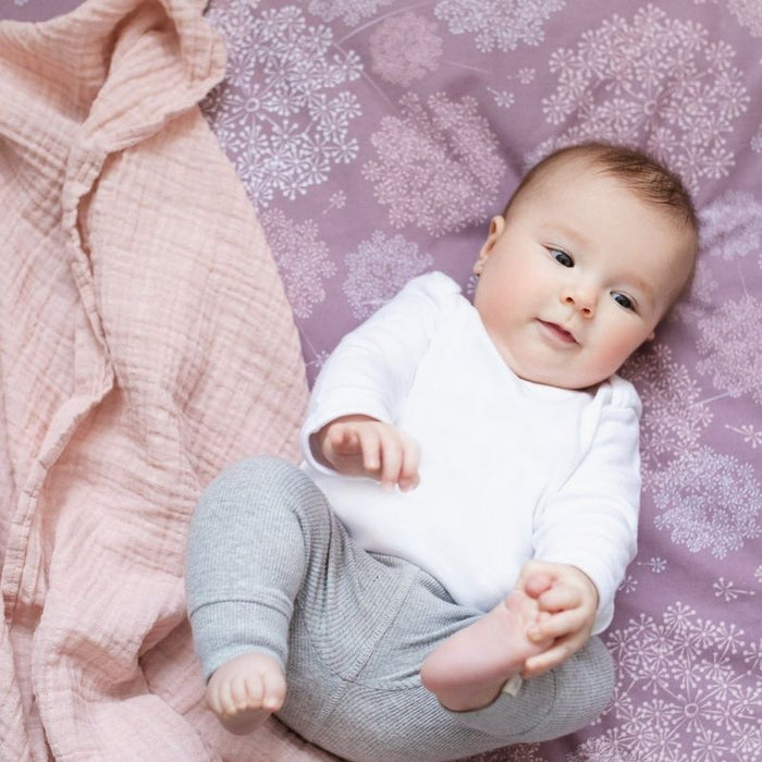 Organic Muslin Swaddle by Perlimpinpin at $10.39! Shop now at Nestled by Snuggle Bugz for Nursery & Decor.