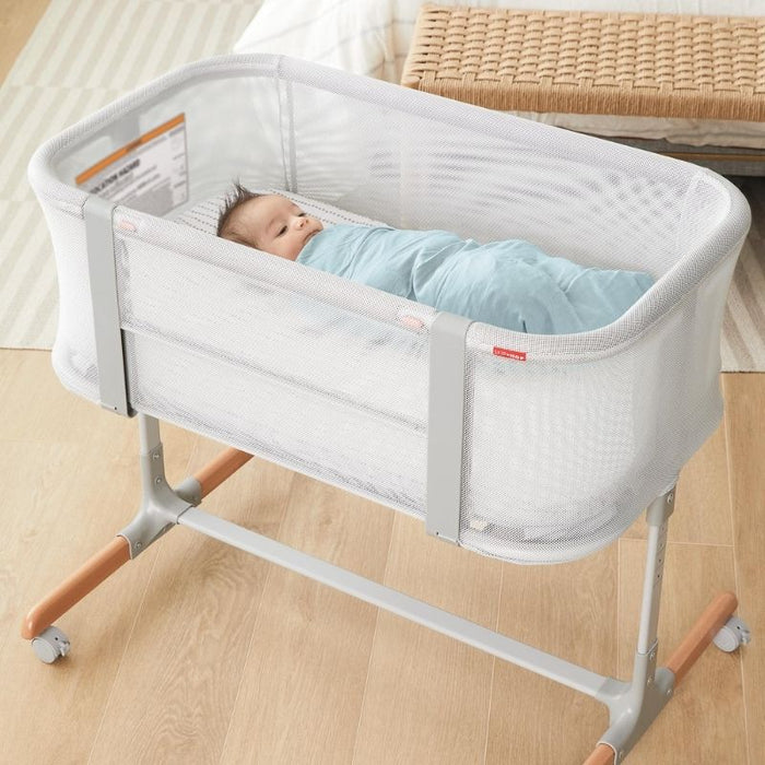 Cozy-Up 2-In-1 Bedside Sleeper & Bassinet by Skip Hop at $294.99! Shop now at Nestled by Snuggle Bugz for Nursery & Décor.