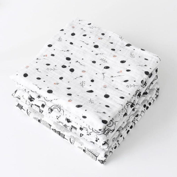 Organic Muslin Swaddle by Wee Gallery at $26.88! Shop now at Nestled by Snuggle Bugz for Nursery & Decor.