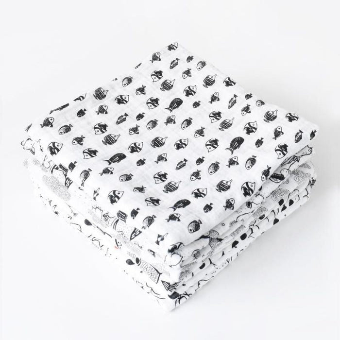 Organic Muslin Swaddle by Wee Gallery at $26.88! Shop now at Nestled by Snuggle Bugz for Nursery & Decor.