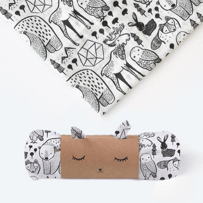 Organic Muslin Swaddle by Wee Gallery at $26.88! Shop now at Nestled by Snuggle Bugz for Nursery & Decor.