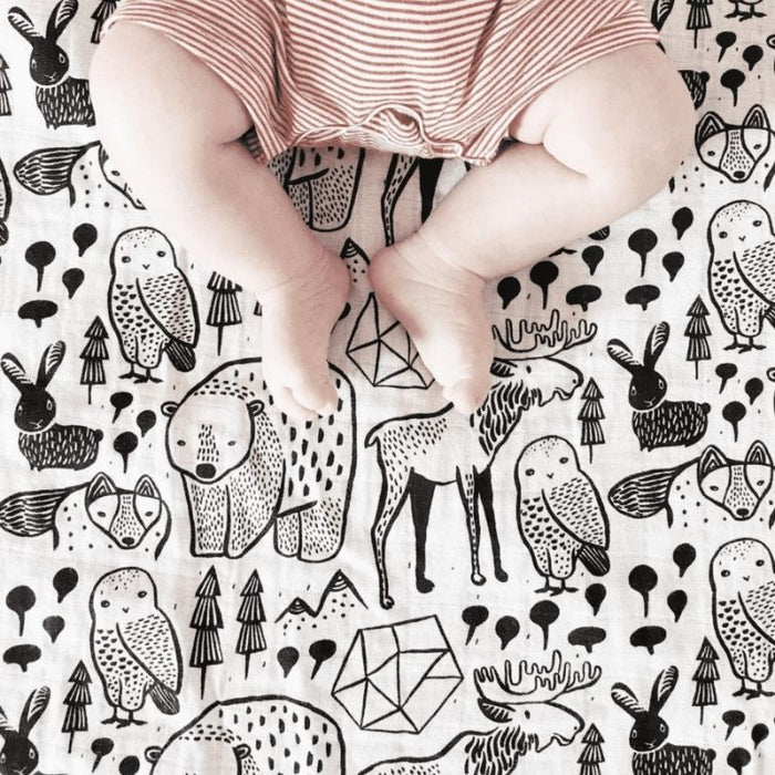 Organic Muslin Swaddle by Wee Gallery at $26.88! Shop now at Nestled by Snuggle Bugz for Nursery & Decor.