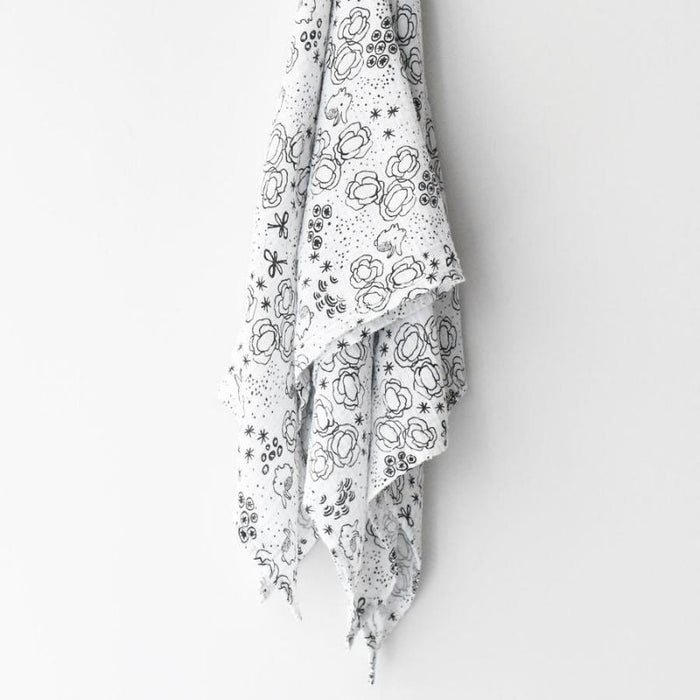 Organic Muslin Swaddle by Wee Gallery at $26.88! Shop now at Nestled by Snuggle Bugz for Nursery & Decor.