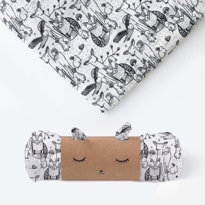 Organic Muslin Swaddle by Wee Gallery at $26.88! Shop now at Nestled by Snuggle Bugz for Nursery & Decor.