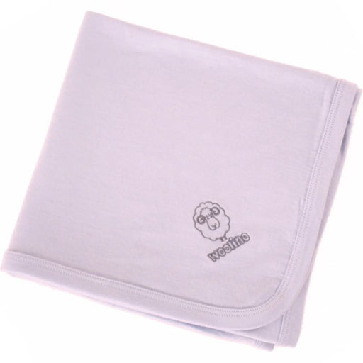 Merino Wool Swaddle Blanket by Woolino at $58! Shop now at Nestled by Snuggle Bugz for Nursery & Decor.