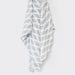 Organic Muslin Swaddle by Wee Gallery at $26.88! Shop now at Nestled by Snuggle Bugz for Nursery & Decor.