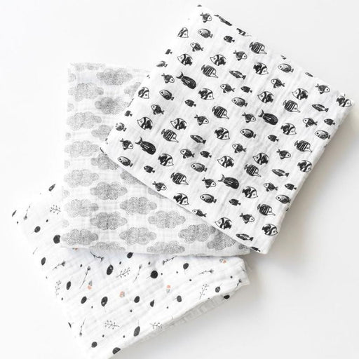 Organic Muslin Swaddle by Wee Gallery at $26.88! Shop now at Nestled by Snuggle Bugz for Nursery & Decor.