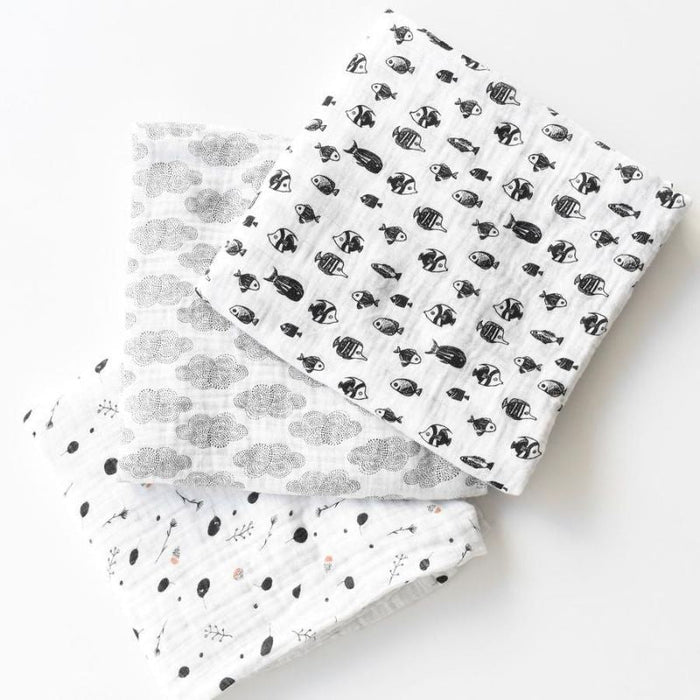 Organic Muslin Swaddle by Wee Gallery at $26.88! Shop now at Nestled by Snuggle Bugz for Nursery & Decor.